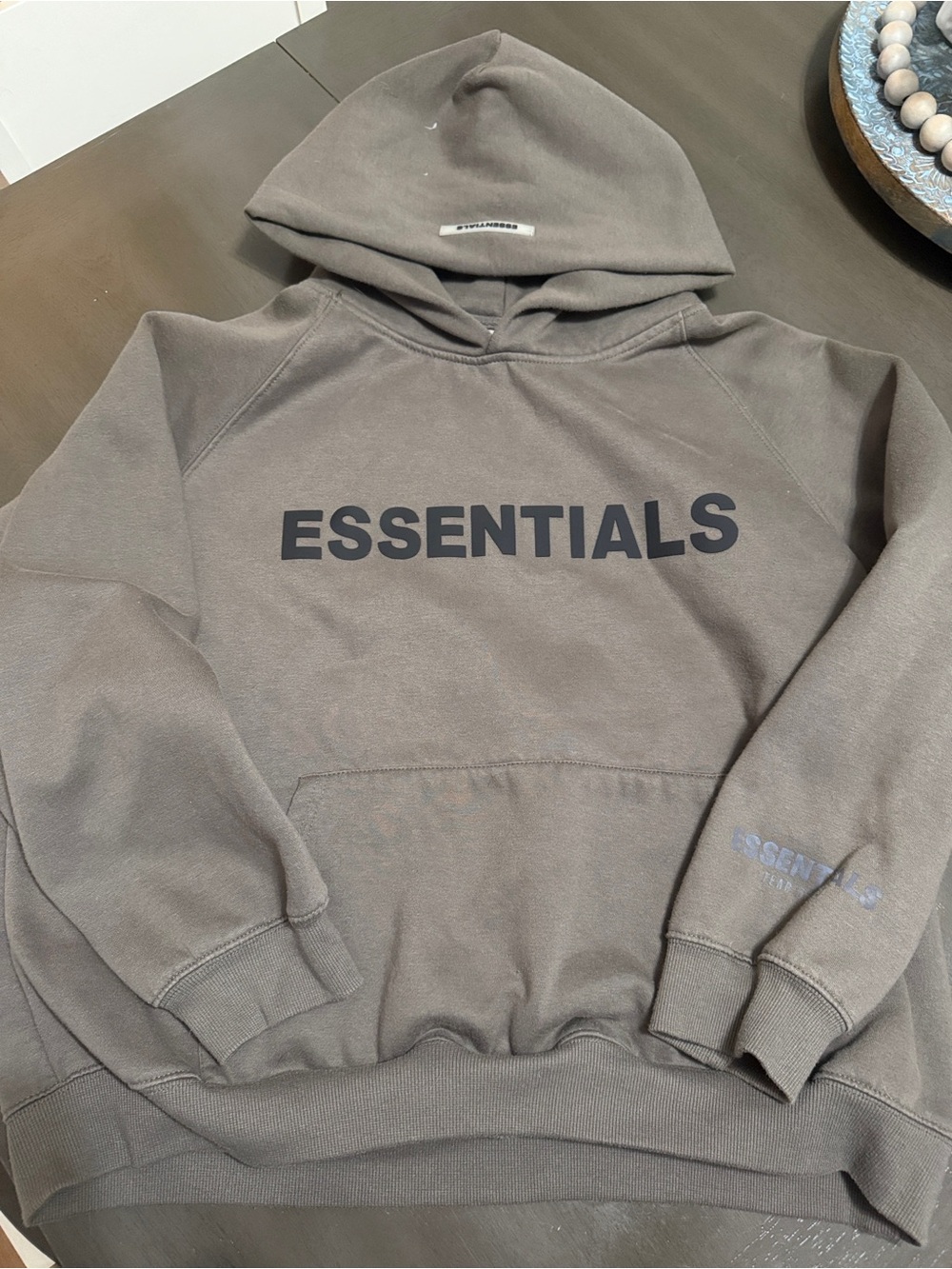 Essentials Men's Hoodie in Taupe with Black Logo